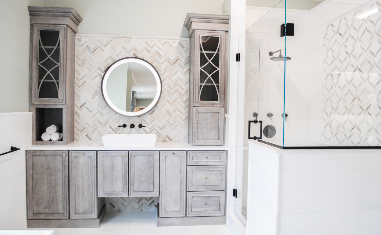 Northeast Flooring & Kitchens bathroom display with walk in custom tile shower, wall tile and vanity