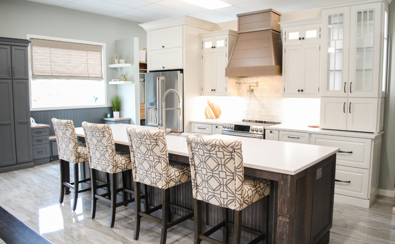 White countertops in a kitchen with white cabinetry
